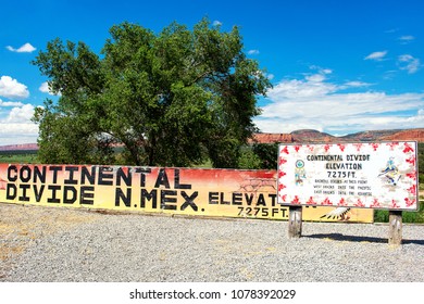 Continental Divide, New Mexico, USA - 07 05 2015: Continental Divide Signs Along Route 66 That Shows The Drainage/water Divide. Waters Flow East Into The Atlantic Ocean Or West Into The Pacific.