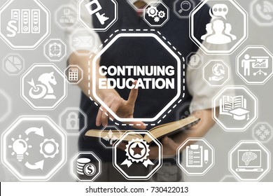 Continuing Education Business School Concept. Man Using Virtual Touch Innovative Interface With Continuing Education Text Button.