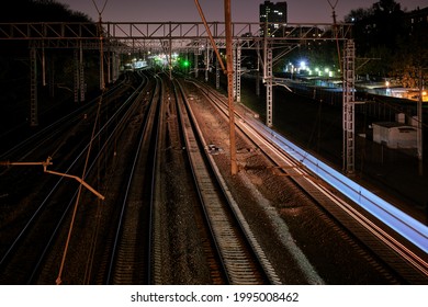 continuous light of a passing train at night city