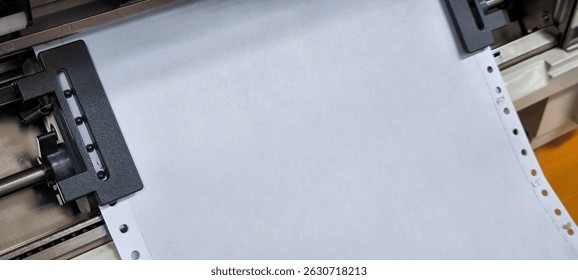 Continuous paper for dot matrix printers.
