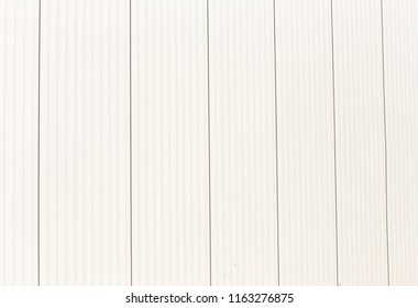  
Continuous vertical straight lines pattern
Factory wall made of metal sheet
Aluminum wall texture background and cement floor with space.Empty for product display. Soft focus, conceptual design  