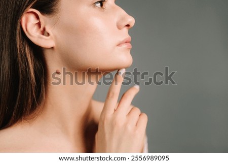 Contouring of the chin and angular jaws. Correcting the shape of the face by doctor. Aesthetic beauty treatment. Improved shape of the face