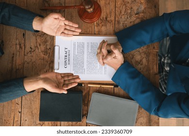 contract of sale was placed on the table in the lawyer office because the company hired the lawyer office as a legal advisor and drafted the contract so that the client could sign the right contract.