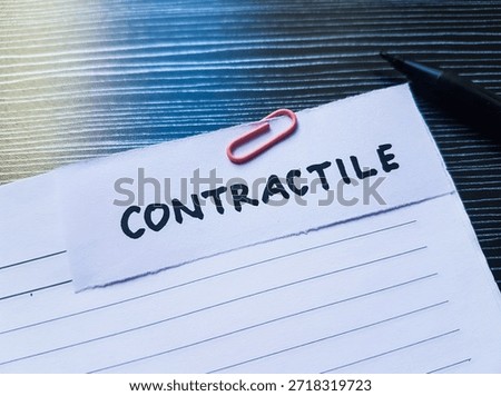 Contractile writting on table  background. 