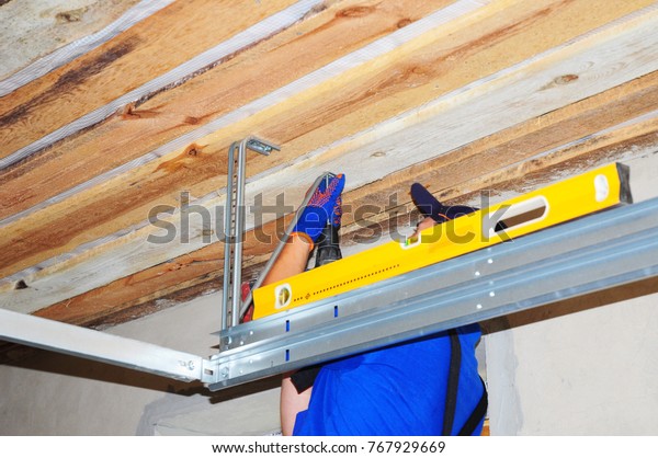 Contractor Installing Garage Door Opener Metal Stock Photo Edit