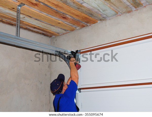 Contractor Installing Garage Door Post Rail Stock Photo Edit Now
