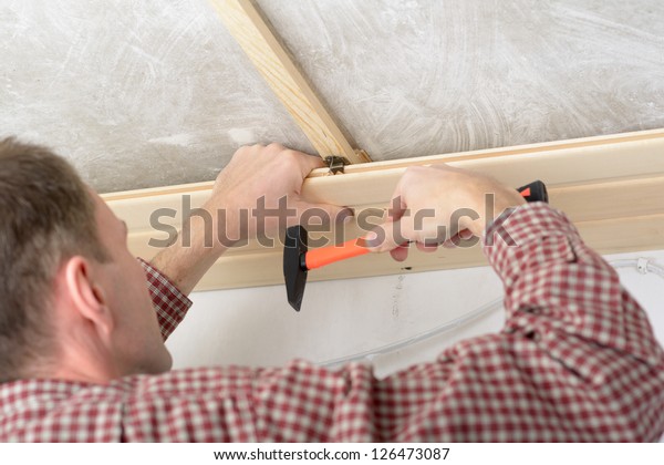 Contractor Installing Wood Panels On Ceiling Stock Photo Edit Now