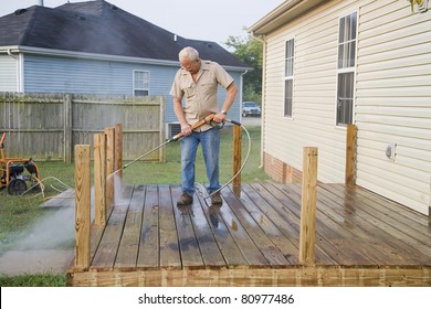 Contractor Pressure Washing Deck , Getting Home Ready To Sell