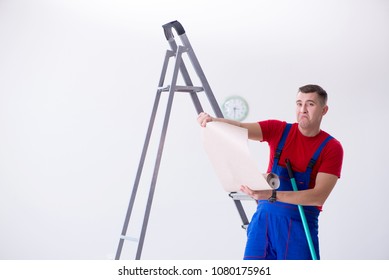 Contractor Worker Preparing For Wallpaper Decoration