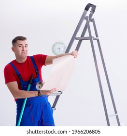 Contractor Worker Preparing For Wallpaper Decoration