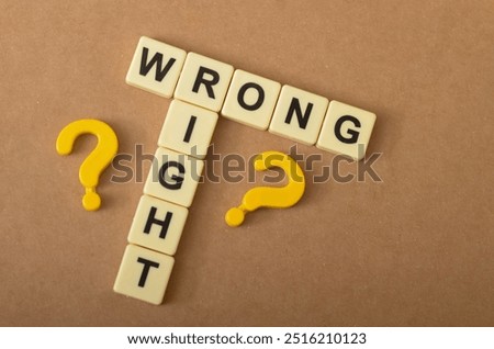 the contrast between right and wrong, with the letters forming the words "RIGHT" and "WRONG" arranged in a conflicting manner.