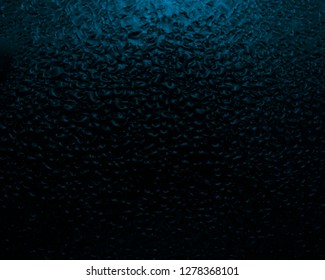 contrast drops the glass  blue tint  dark fogged glass  texture  background 