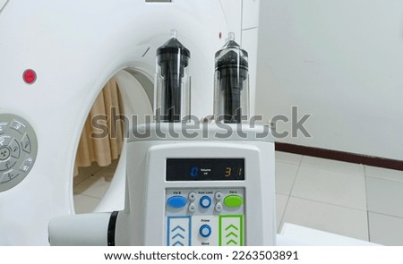 contrast injector in a CT Scan room in a hospital