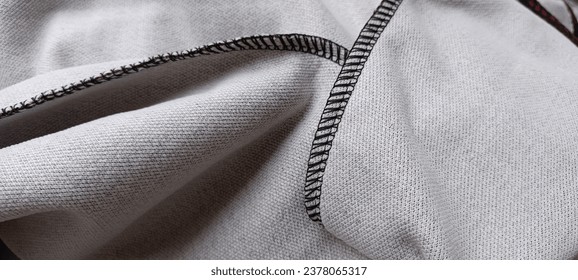Contrast overlocker stitches of stretchy fabric