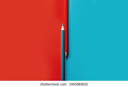 
contrasting image of colored pencils. opposition of red and blue. concept for office, school, writing - Shutterstock ID 1965083032