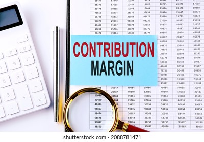 CONTRIBUTION MARGIN on sticker on the chart background, business concept