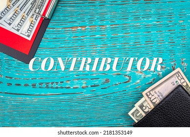 CONTRIBUTOR - word (text) and money dollars on the table in a notebook, wallet. Business concept, buying goods and products, paying for services (copy space).
