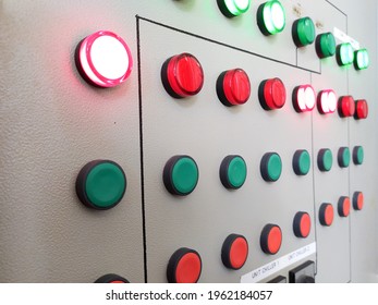 control buttons on the electrical panel, manchine control panel with indicator lights.