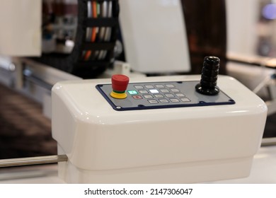 Control panel of automatic fabric cutting machine. Selective focus.