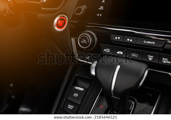 Control panel car air
conditioner dashboard console Technology in a modern car. Color
detail with the air conditioning button inside a car. Car interior.
air condition