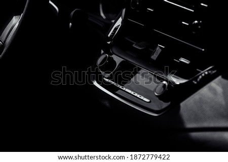 control panel and cd in a new modern car interior