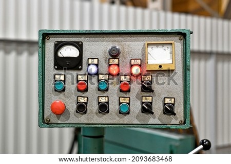 The control panel from the CNC machine which gives the command to process the part.