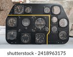 Control panel, command and indicator clocks of the cockpit of a P-51 Mustang fighter plane from the Second World War