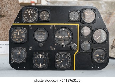 Control panel, command and indicator clocks of the cockpit of a P-51 Mustang fighter plane from the Second World War - Powered by Shutterstock