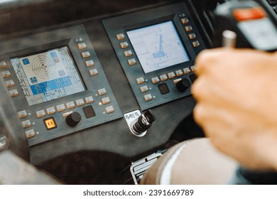 The control panel of the crane in the driver's cabin of the automobile crane.