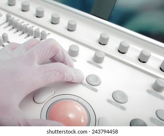 Control Panel Of Medical Device With Doctor's Hand