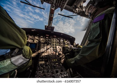 Control Panel In Military Helicopter Cockpit, Copter Dashboard With Displays, Dials, Buttons, Switches, Faders, Knobs, Other Toggle Items, Air Force, Modern Aviation And Aerospace Industry
