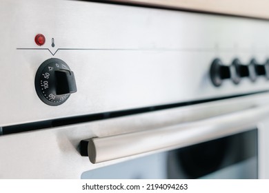 control panel on built in electric oven with button for adjustment temperature, closeup. modern technology and kitchen appliance concept - Shutterstock ID 2194094263