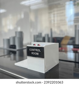 A control room is a centralised location where different systems or processes are coordinated, controlled, and monitored.