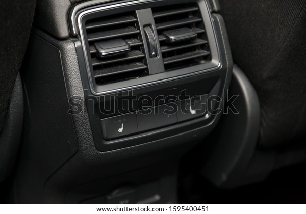 Control\
switch heated two rear seats on the car dashboard with plastic\
buttons to control the temperature of the passenger compartment and\
comfort while driving. Auto service\
industry.