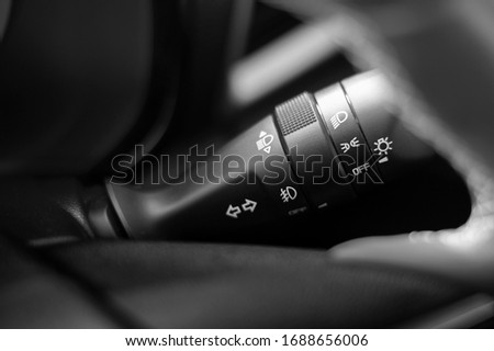 Control switch power light system of car right side steering close up.
Left-right turn signal, Blinker, high beam, headlight, fog light.