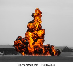 Controlled explosion on black and white backdrop.