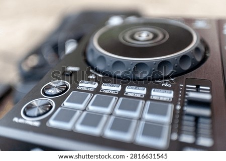Controller wheel performance pad audio hardware music technology broadcast precision entertainment production execution manipulation synchronization frequency methodology rhythm