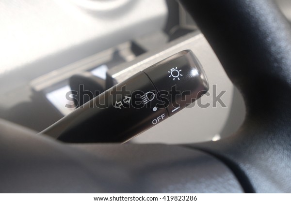 controlling handle turn\
signal of car\
