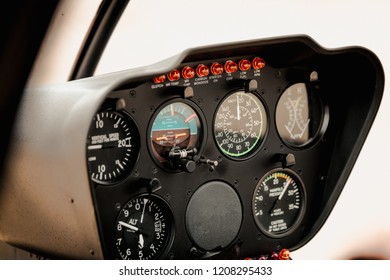 Controls And Gauges In The Cockpit Of A Small Private Helicopter Preparing For Takeoff