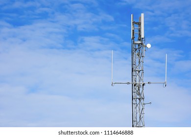 Controversial 5G Antenna Mast Against Blue Sky With Copy Space.Wirless Network Mast  In Rural Britain.Connectivity UK.Burning Issue.Outdoor Wifi Internet Station.Modern Technology.
