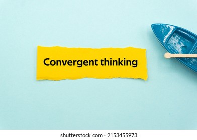 Convergent thinking.The word is written on a slip of colored paper. Psychological terms, psychologic words, Spiritual terminology. psychiatric research. Mental Health Buzzwords.