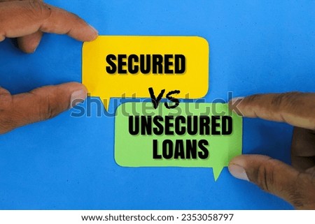 conversation bubbles with the words Secured vs Unsecured Loans. Business concept 