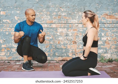 Conversation, talking and coach with woman for workout, exercise and fitness for sport. Partnership, personal trainer and athlete on break by brick wall at gym for wellness, training and health - Powered by Shutterstock