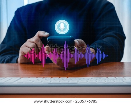 Conversation voice search application technology concept. Digital sound wave audio graphic on smartphone while man press on virtual microphone button. AI conversation assistant automation bot tools. 