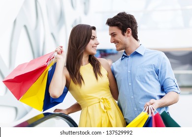 Conversing couple on shopping - Powered by Shutterstock