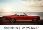 Convertible, car and sunset at beach for travel with road trip, adventure and journey with mockup space. Empty vehicle, vintage and transport on coast at seaside for ocean sunrise, park and scenery