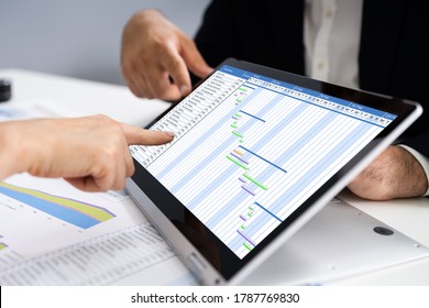 Convertible Laptop With Gantt Software Chart And Agenda