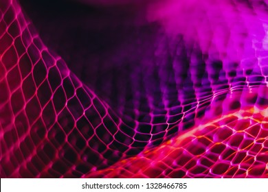 Convex mesh that represents internet connectivity. The bright colors of the linked wire are characteristic of waves. concept cloud computing and neural networks.