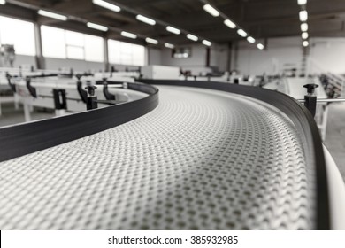 conveyer belt close up - Shutterstock ID 385932985