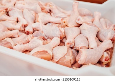 Conveyor Belt Food.The Meat Factory.Automated Production Line In Modern Food Factory.Containers On A Conveyor Line With Raw Chicken Drumstick.Factory For The Production Of Food From Meat,poultry.